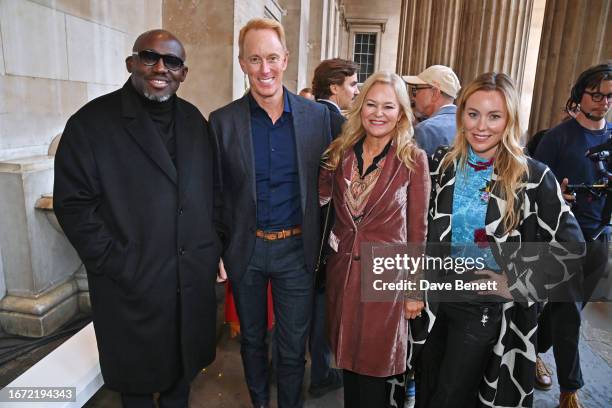 Editor-In-Chief of British Vogue Edward Enninful, Conde Nast CEO Roger Lynch, Cathleen Lynch and Cristina Lynch Baxter attend the Erdem show during...