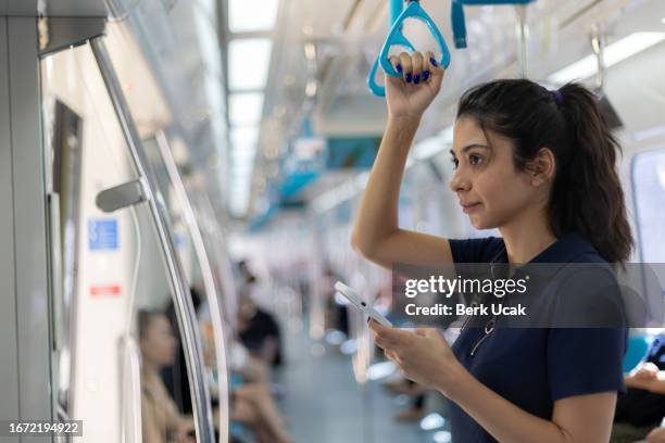 young woman is traveling by train. - east african tribe stock pictures, royalty-free photos & images