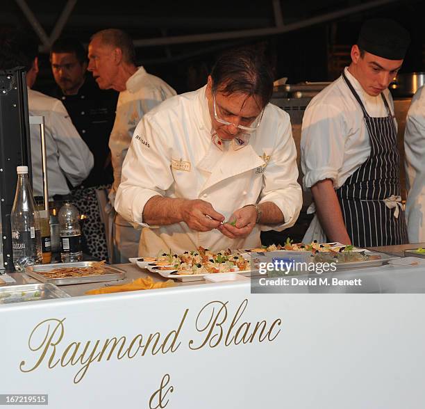 Raymond Blanc cooking at Relais & Chateaux's 'Diner des Grands Chefs London 2013' in aid of Action Against Hunger at The Old Billingsgate on April...