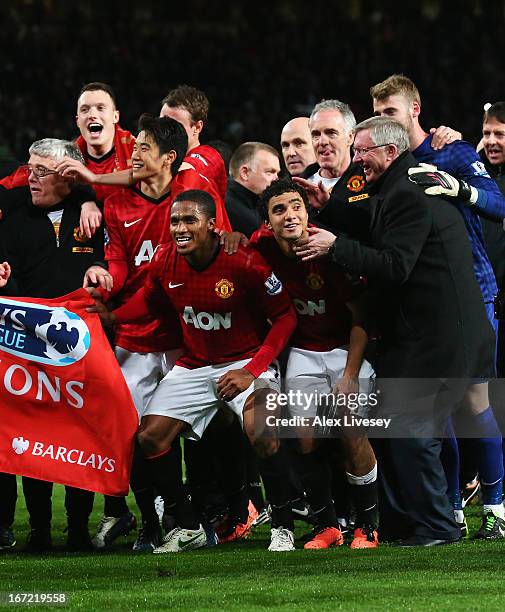 Phil Jones, Shinji Kagawa, Antonio Valencia, Rafael and manager Sir Alex Ferguson of Manchester United celebrate winning the Premier League title...