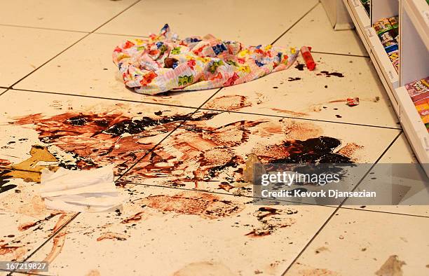 Dried blood trails are still visible inside the Sugar Heavan store near the finish line of the Boston Marathon on April 22, 2013 in Boston,...