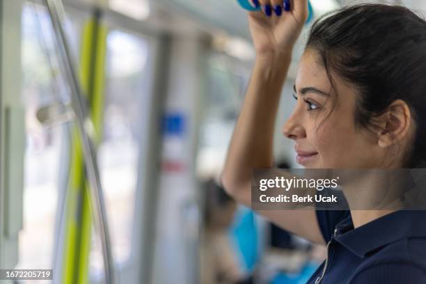 young woman is traveling by train. - east african tribe stock pictures, royalty-free photos & images