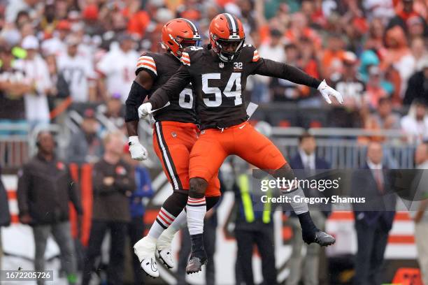 Ogbo Okoronkwo of the Cleveland Browns celebrates a sack against the Cincinnati Bengals during the first half at Cleveland Browns Stadium on...