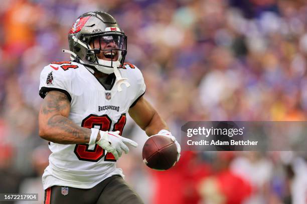 Antoine Winfield Jr. #31 of the Tampa Bay Buccaneers reacts after forcing and recovering a fumble by Kirk Cousins of the Minnesota Vikings at U.S....