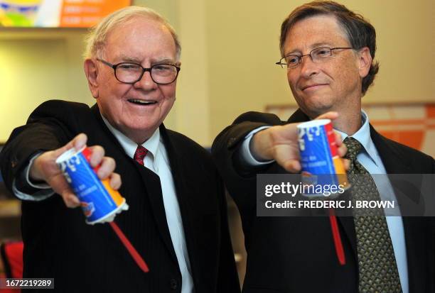 Billionaire investor Warren Buffett and Microsoft founder Bill Gates flip over their Dairy Queen Blizzard treats, the most successful product ever...