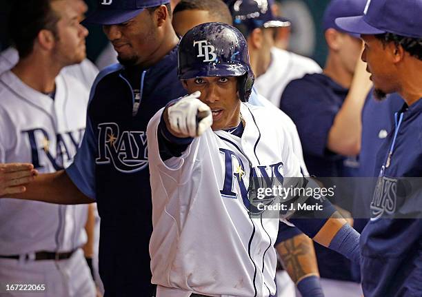 Shortstop Yunel Escobar of the Tampa Bay Rays celebrates his first inning home run against the New York Yankees at Tropicana Field on April 22, 2013...