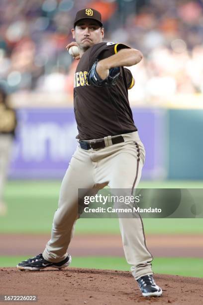 Seth Lugo of the San Diego Padres delivers during the first inning against the Houston Astros at Minute Maid Park on September 09, 2023 in Houston,...