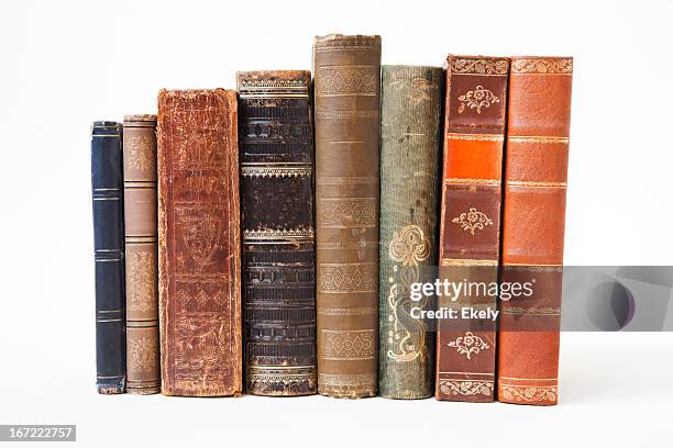 old books on white background. - bookshelf stockfoto's en -beelden