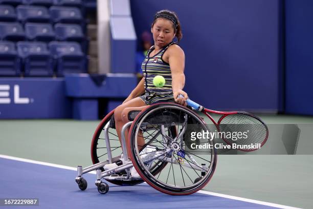 Yui Kamiji of Japan returns a shot against Diede De Groot of the Netherlands during their Wheelchair Women's Singles Final match on Day Fourteen of...