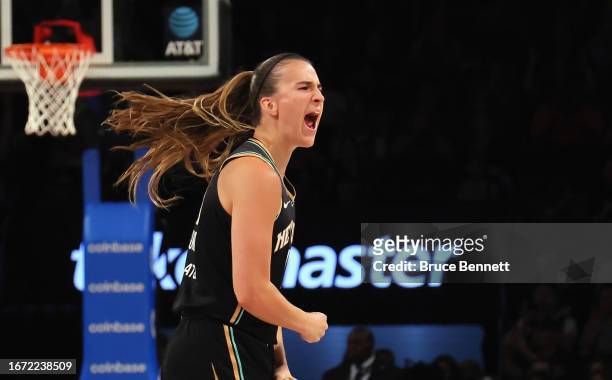 Sabrina Ionescu of the New York Liberty celebrates her three pointer against the Washington Mystics at Barclays Center on September 10, 2023 in the...