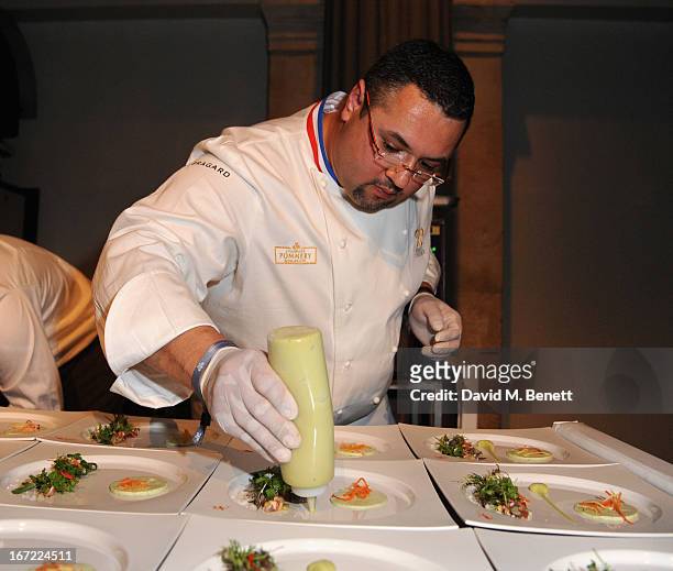 Jean-Luc Rocha cooking at Relais & Chateaux's 'Diner des Grands Chefs London 2013' in aid of Action Against Hunger at The Old Billingsgate on April...
