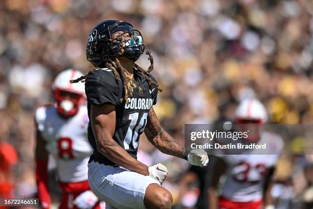 Wide receiver Xavier Weaver of the Colorado Buffaloes celebrates after a 39 yeard gain and first down on a catch in the fourth quarter against the...