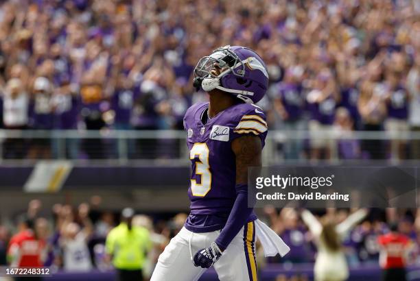 Jordan Addison of the Minnesota Vikings celebrates after scoring a touchdown in the second quarter of a game against the Tampa Bay Buccaneers at U.S....