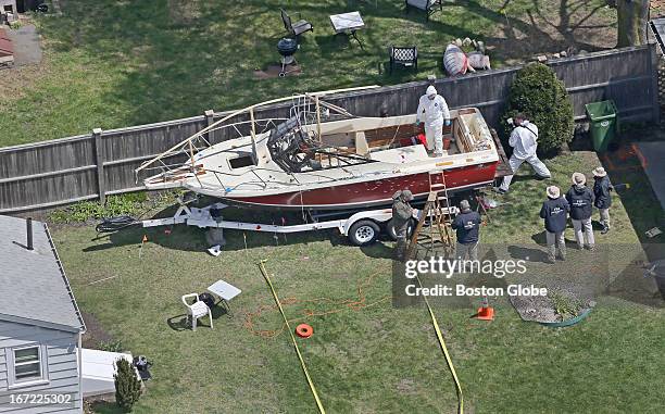 Aerial view of the boat where one of the Boston Marathon bombing suspects was found, in a backyard on Franklin Street. The boat and surrounding scene...