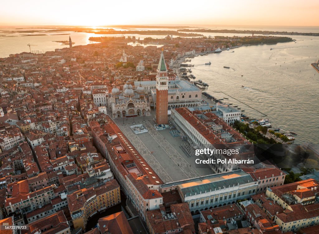 Venice, Aerial sunrise view of St. Mark's Square with Doge's Palace, Basilica, and Campanile, Italy