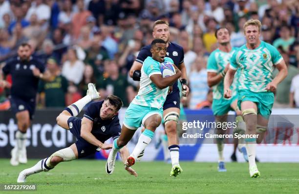 Grant Williams of South Africa breaks with the ball during the Rugby World Cup France 2023 match between South Africa and Scotland at Stade Velodrome...