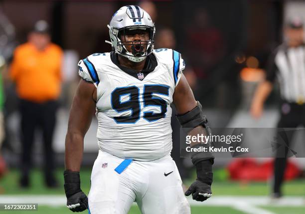 Derrick Brown of the Carolina Panthers celebrates after a sack during the second quarter against the Atlanta Falcons at Mercedes-Benz Stadium on...