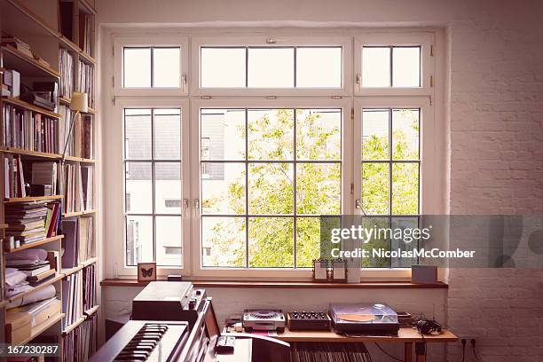 window into the music room - bay window interior stock pictures, royalty-free photos & images