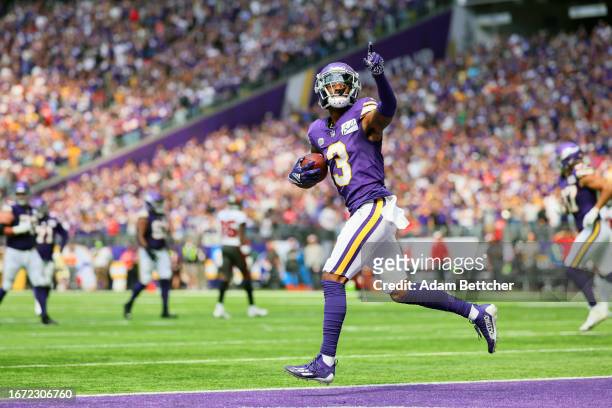 Jordan Addison of the Minnesota Vikings reacts after scoring a touchdown in the second quarter of a game against the Tampa Bay Buccaneers at U.S....