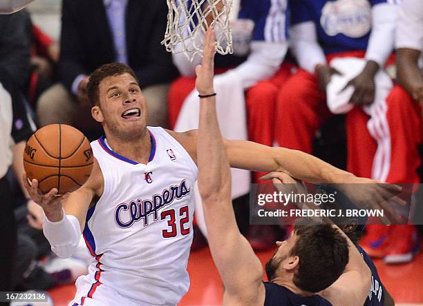 Blake Griffin of the Los Angeles Clippers goes to the basket against Marc Gasol and Zach Randolph of the Memphis Grizzlies during game two of their...