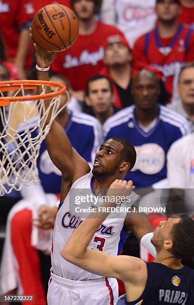 Chris Paul of the Los Angeles Clippers dunks before Tayshaun Prince of the Memphis Grizzlies during game two of their NBA Basketball playoff series...