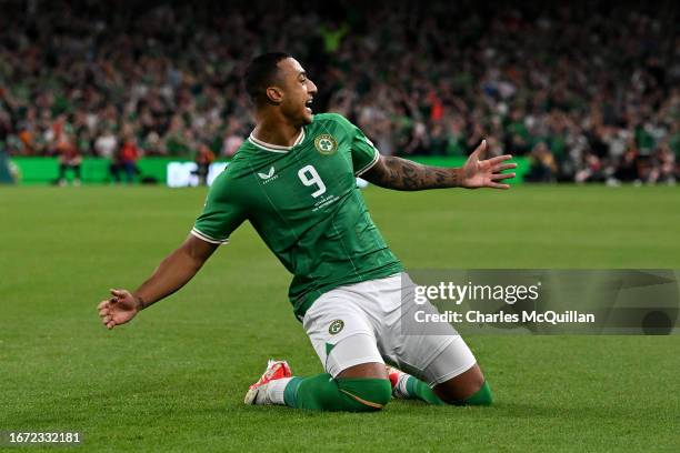 Adam Idah of Republic of Ireland celebrates after scoring the team's first goal from a penalty kick during the UEFA EURO 2024 European qualifier...