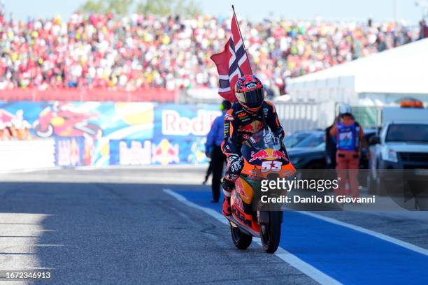 Deniz Oncü of Turkey and Red Bull KTM Ajo celebrate the third place of Moto 3 race of the MotoGP Of San Marino at Misano World Circuit on September...