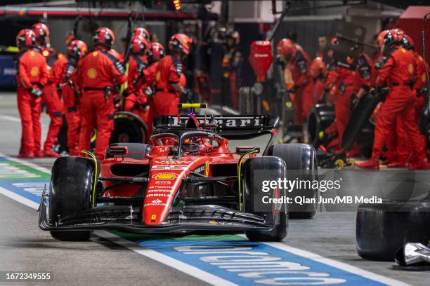 Carlos Sainz of Spain driving the Ferrari SF-23 after his pit stop during the F1 Grand Prix of Singapore at Marina Bay Street Circuit on September...