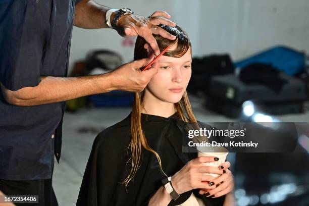 TRESemme Lead Hairstylist Jimmy Paul works backstage for TRESemme X Jason Wu during NYFW on September 10, 2023 in New York City.