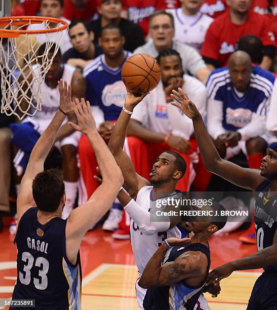 Chris Paul of the Los Angeles Clippers heads to the basket against Marc Gasol of the Memphis Grizzlies during game two of their NBA Basketball...