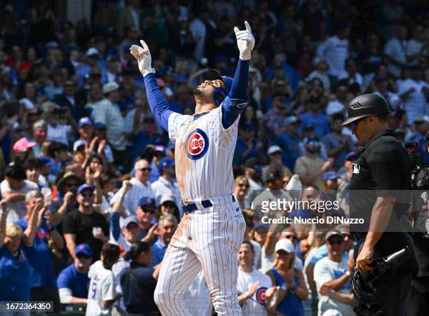 Christopher Morel of the Chicago Cubs celebrates a home run during the third inning of a game against the Arizona Diamondbacks at Wrigley Field on...