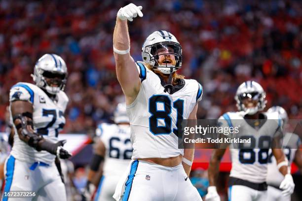 Hayden Hurst of the Carolina Panthers celebrates after his touchdown reception during the second quarter against the Atlanta Falcons at Mercedes-Benz...