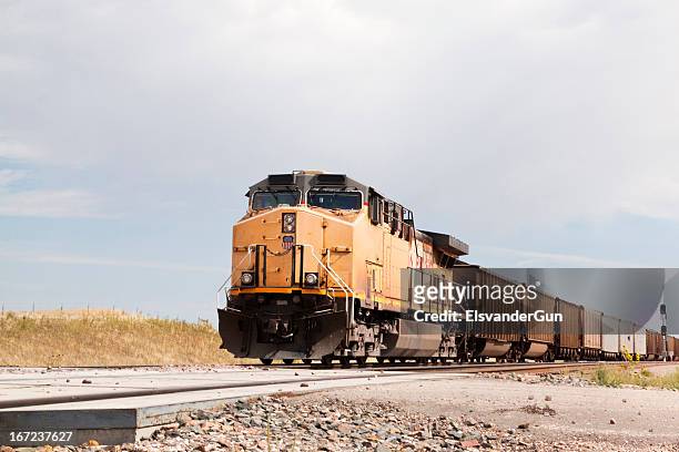 union pacific railroad train approaching - boxcar stock pictures, royalty-free photos & images