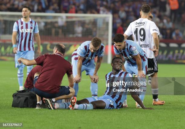Onuachu of Trabzonspor lies on the ground after injury during Turkish Super Lig soccer match between Trabzonspor and Besiktas at Papara Park in...