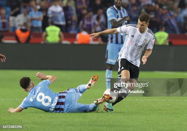 Bardhi of Trabzonspor in action against Salih Ucan of Besiktas during Turkish Super Lig soccer match between Trabzonspor and Besiktas at Papara Park...