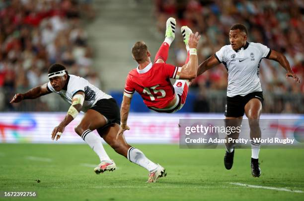 Vinaya Habosi of Fiji commits an illegal no arms challenge on Liam Williams of Wales which resulted in an off-field match official awarding a Wales...