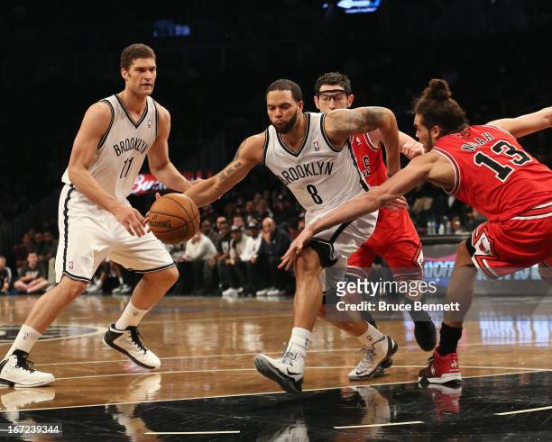 Deron Williams of the Brooklyn Nets dribbles the ball against the Chicago Bulls during Game Two of the Eastern Conference Quarterfinals of the 2013...