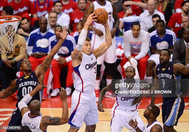 Blake Griffin of the Los Angeles Clippers hauls in a rebound against the Memphis Grizzlies during game two of their NBA Basketball playoff series at...