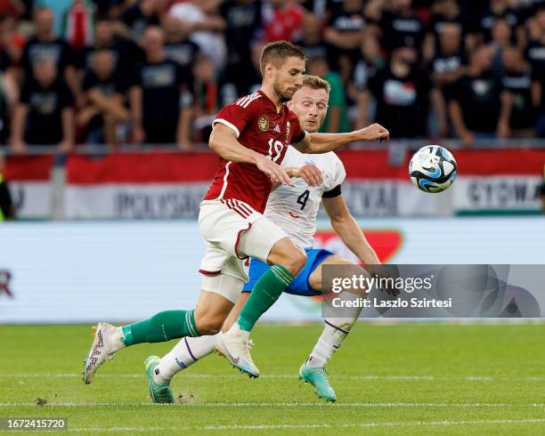 Barnabas Varga of Hungary fights for the possession with Jakub Brabec of Czech Republic during the International Friendly match between Hungary and...