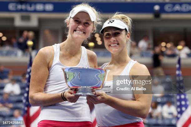 Gabriela Dabrowski of Canada and partner Erin Routliffe of New Zealand celebrate after defeating Laura Siegemund of Germany and Vera Zvonareva of...