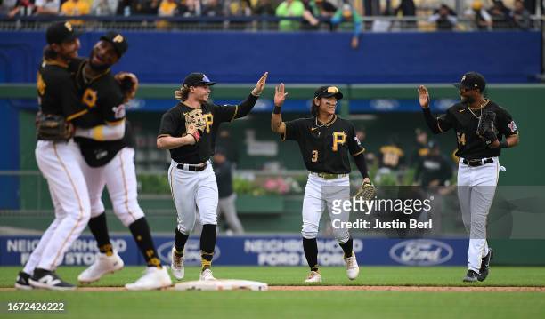 The Pittsburgh Pirates celebrate following a 3-2 win over the New York Yankees during the game at PNC Park on September 17, 2023 in Pittsburgh,...