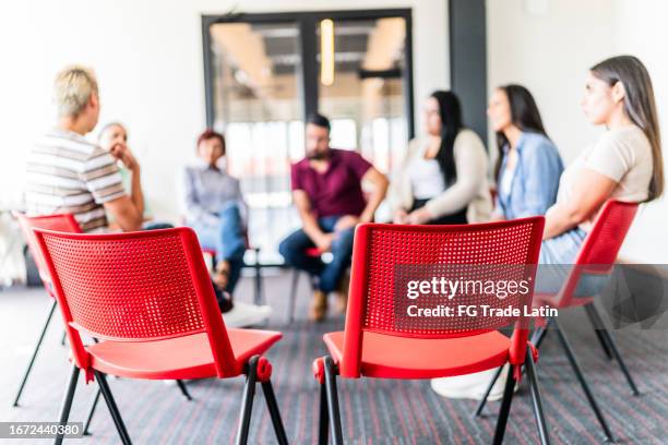 close-up of two empty chairs on a therapy - empty chair stock pictures, royalty-free photos & images