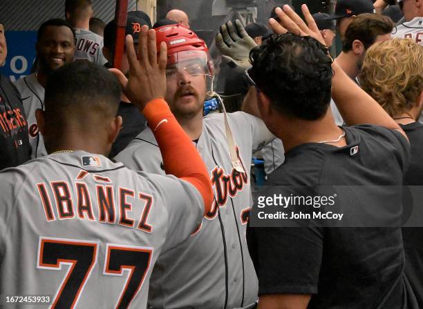 Jake Rogers of the Detroit Tigers is congratulated after his second inning home run against the Los Angeles Angels at Angel Stadium of Anaheim on...