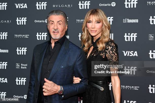 Sylvester Stallone and Jennifer Flavin attend Netflix's "Sly" world premiere during the Toronto International Film Festival at Roy Thomson Hall on...
