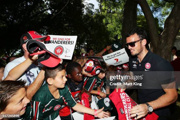 Mark Bridge signs autographs for fans during a Western Sydney Wanderers A-League Civic Reception on April 23, 2013 in Parramatta, Australia.