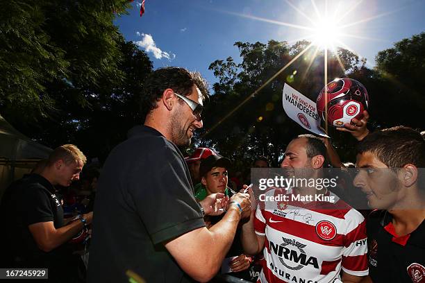 Wanderers coach Tony Popovic signs autographs for fans during a Western Sydney Wanderers A-League Civic Reception on April 23, 2013 in Parramatta,...