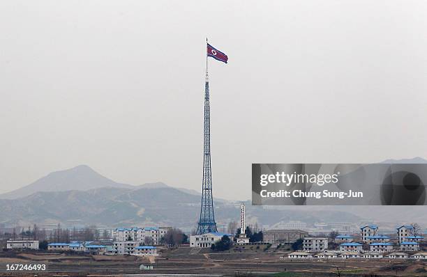 North Korean national flag in North Korea's propaganda village of Gijungdong is seen from an observation post on April 23, 2013 in Panmunjom, South...