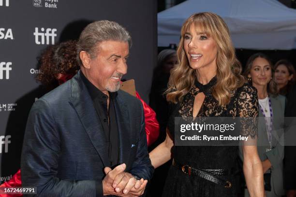 Sylvester Stallone and Jennifer Flavin attend Netflix's "Sly" world premiere during the Toronto International Film Festival at Roy Thomson Hall on...