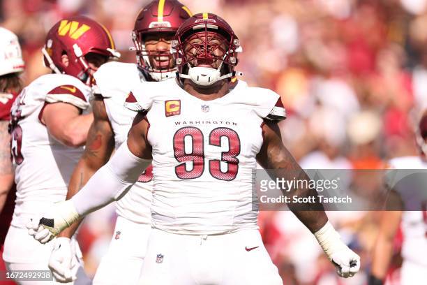 Jonathan Allen of the Washington Commanders celebrates after a play during the fourth quarter against the Arizona Cardinalsat FedExField on September...