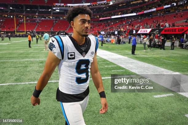 Bryce Young of the Carolina Panthers walks off the field after Carolina's 24-10 loss to the Atlanta Falcons at Mercedes-Benz Stadium on September 10,...